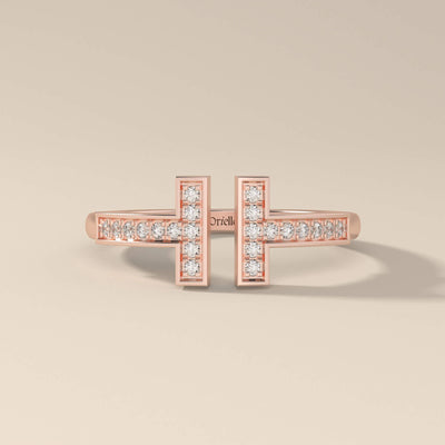 Shared prong yellow gold ring with open front design
