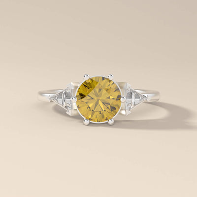 Classic yellow gold moissanite promise ring with a round center stone
