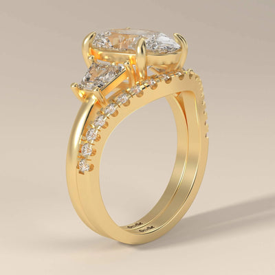 yellow gold bridal sets featuring oval diamond engagement ring
