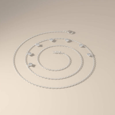 Seven stone distance pendant in polished yellow gold
