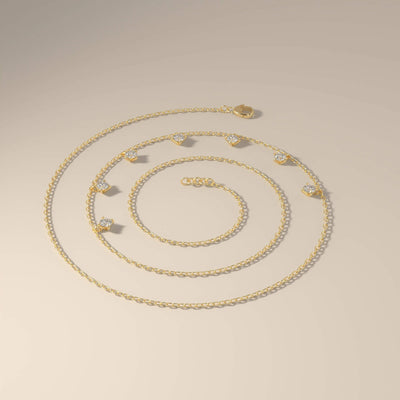 7 stone moissanite pendant in yellow gold prong setting
