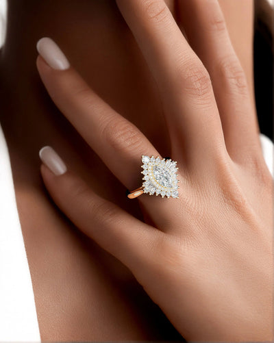 Cathedral setting marquise moissanite halo ring
