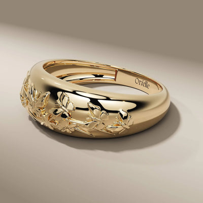 floral engagement ring featuring butterfly engraved design
