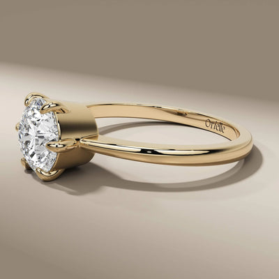 prong setting ring with round lab grown diamond centerpiece
