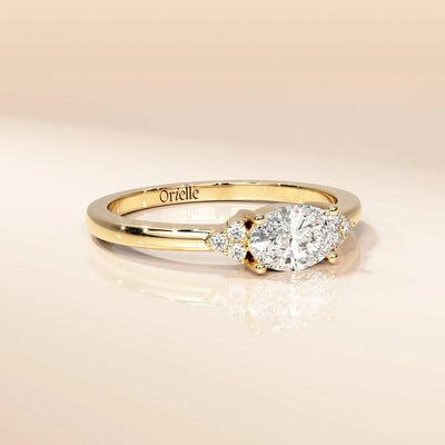 Yellow gold oval moissanite ring in prong setting
