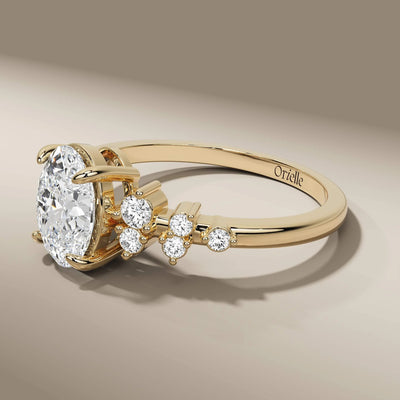 side round diamond ring paired with oval engagement center
