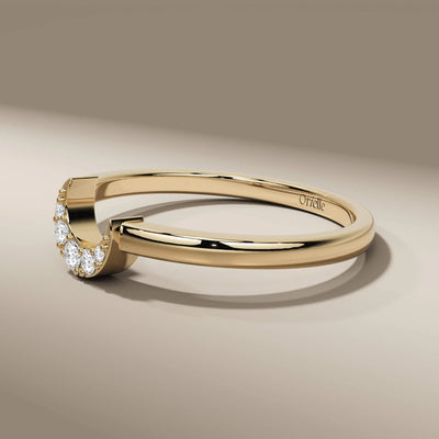 yellow gold half moon wedding band with prong setting

