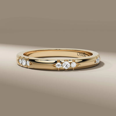 Minimalist yellow gold round band crafted as a designer piece
