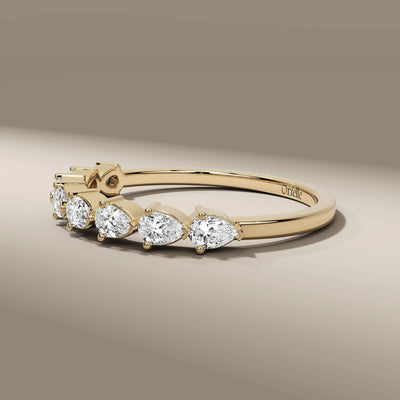 handmade pear cut shared prong diamond wedding band
