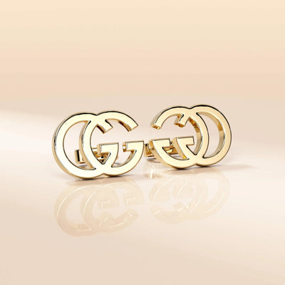 designer stud earrings featuring bold double g motif
