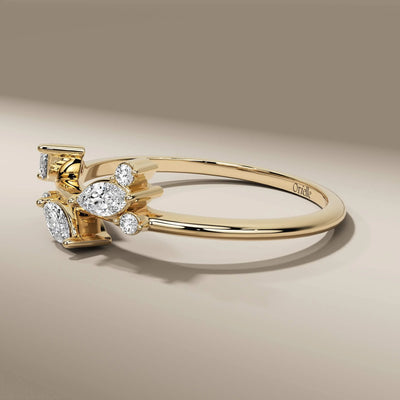 yellow gold ring featuring vintage marquise diamond design
