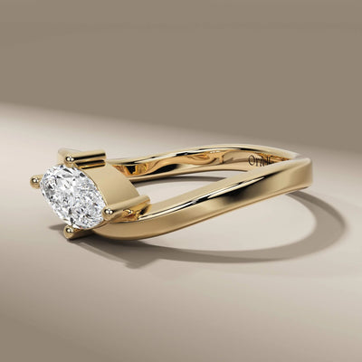 4 prong east west marquise ring with lab grown diamond
