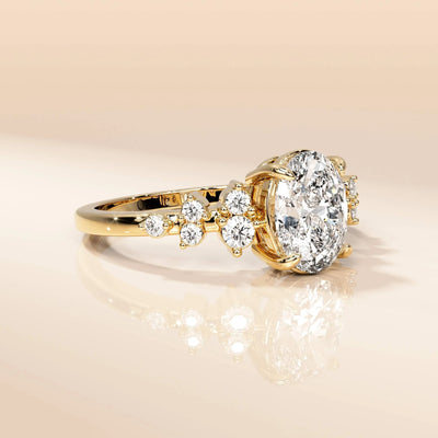 Unique design oval cut ring with round side stone accents
