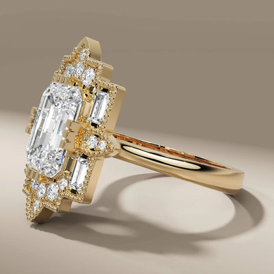art deco emerald engagement ring with milgrain detailing
