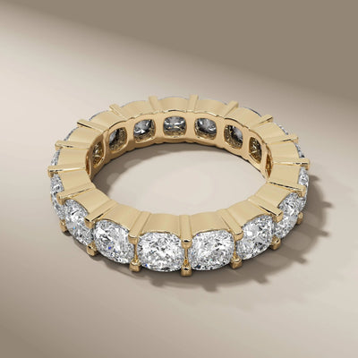 yellow gold full eternity cushion diamond shared prong band
