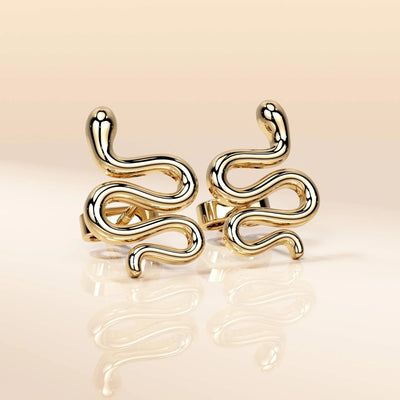 snake stud earrings crafted in polished yellow gold style
