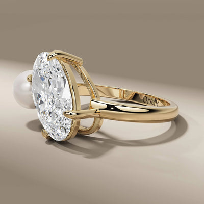 oval cut diamond ring crafted in yellow gold engagement style
