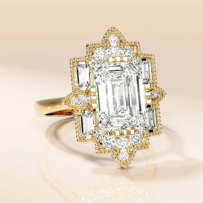 Emerald cut diamond ring with ornate gold detail