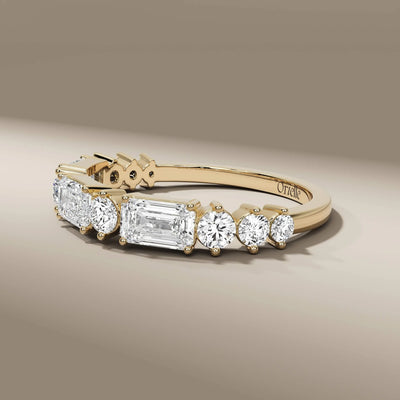 designer emerald diamond half eternity yellow gold band
