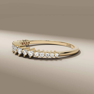dainty round diamond half eternity band in yellow gold
