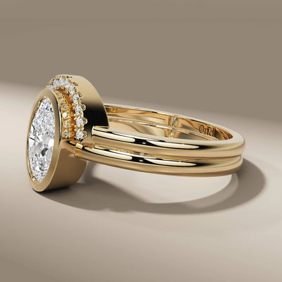 white gold bridal set featuring oval cut lab grown diamond ring
