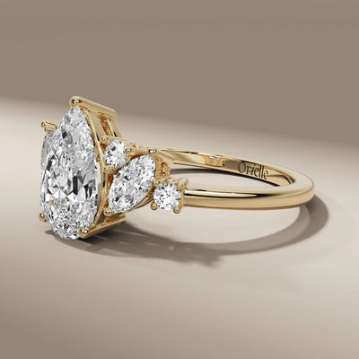 Nature inspired pear cut ring with prong set lab grown diamond

