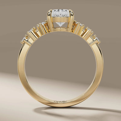 yellow gold engagement ring with unique oval design
