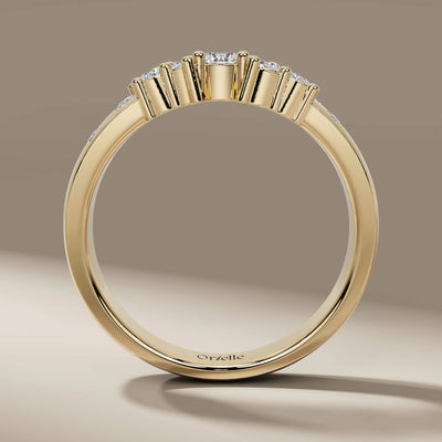 designer round wedding band in prong setting yellow gold
