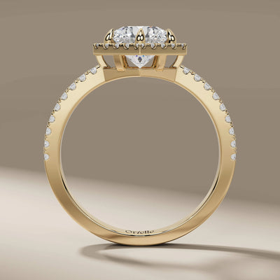 pave setting ring with round diamonds in halo engagement style
