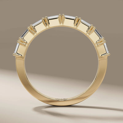 designer baguette cut half eternity wedding band in gold
