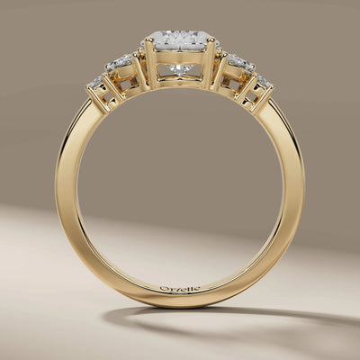 Handmade pear cut diamond ring with marquise side stone design
