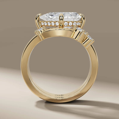 curved wedding band set with pear cut diamond engagement ring
