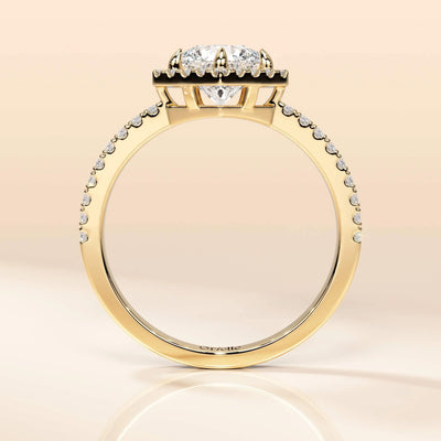 Yellow gold halo engagement ring with brilliant round center
