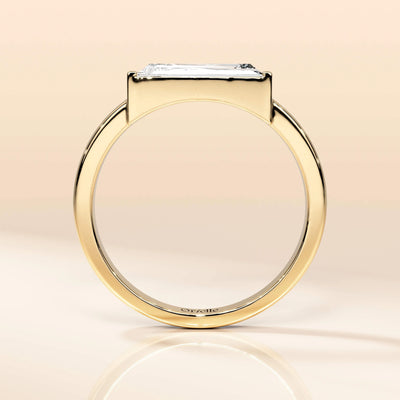 Bar setting engagement ring featuring a sleek geometric design
